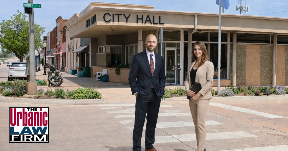 Kingfisher Oklahoma Municipal Court criminal defense lawyers image featuring a professional attorney and client outside Kingfisher City Hall for The Urbanic Law Firm.