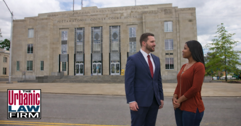 Attorney and client standing outside the Pottawatomie County courthouse in Oklahoma, illustrating Pottawatomie County Oklahoma criminal defense lawyers at The Urbanic Law Firm.