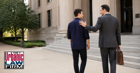 Second degree rape Oklahoma criminal defense scene showing an attorney and client walking outside a courthouse, illustrating The Urbanic Law Firm’s Oklahoma criminal defense representation.