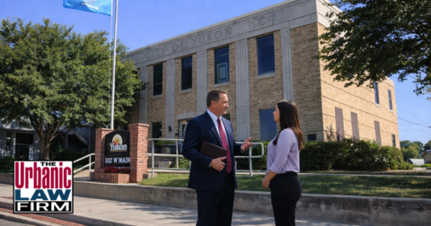 Yukon Oklahoma Municipal Court Criminal Defense Lawyers meeting a client outside the Yukon municipal court building, illustrating Oklahoma criminal defense representation by The Urbanic Law Firm.