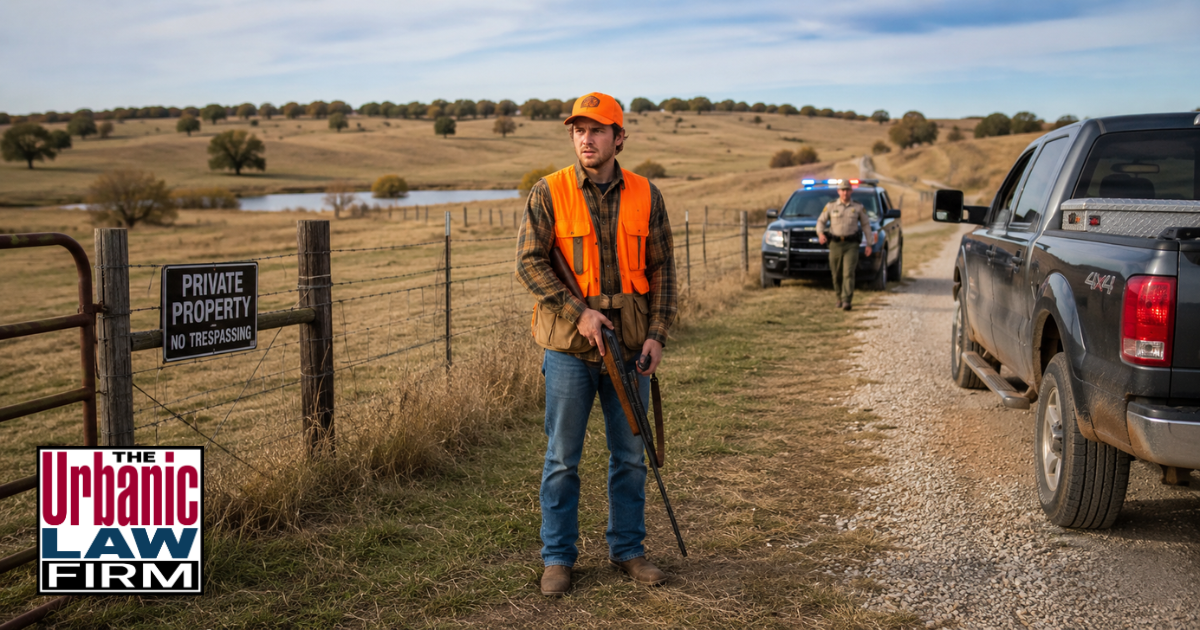 Hunter near a private property fence during an Oklahoma hunting trespass investigation, illustrating criminal defense help from The Urbanic Law Firm.